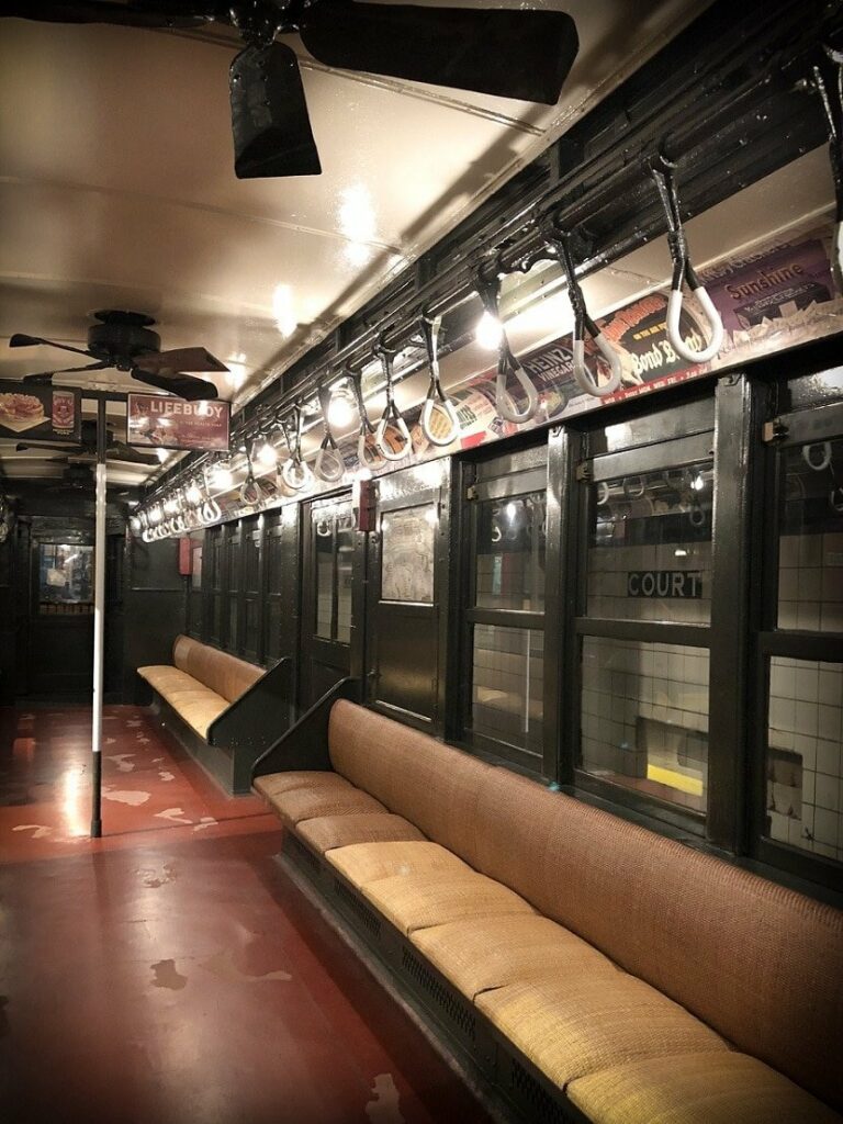 A vintage subway car at the New York Transit Museum, a family-friendly Brooklyn transit museum