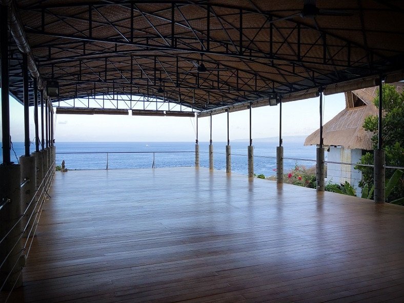 A yoga space over looking the ocean in Bali, Indonesia, for reflection while raising kids to be an avid traveller