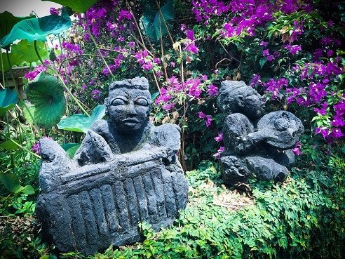 Small stone decorative carvings at a Bali eco stay in Padang Bai, Indonesia.