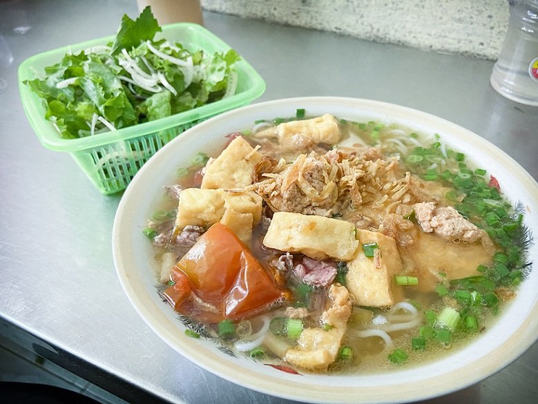 A bowl of bun rieu cua, food in Hanoi made of crab soup