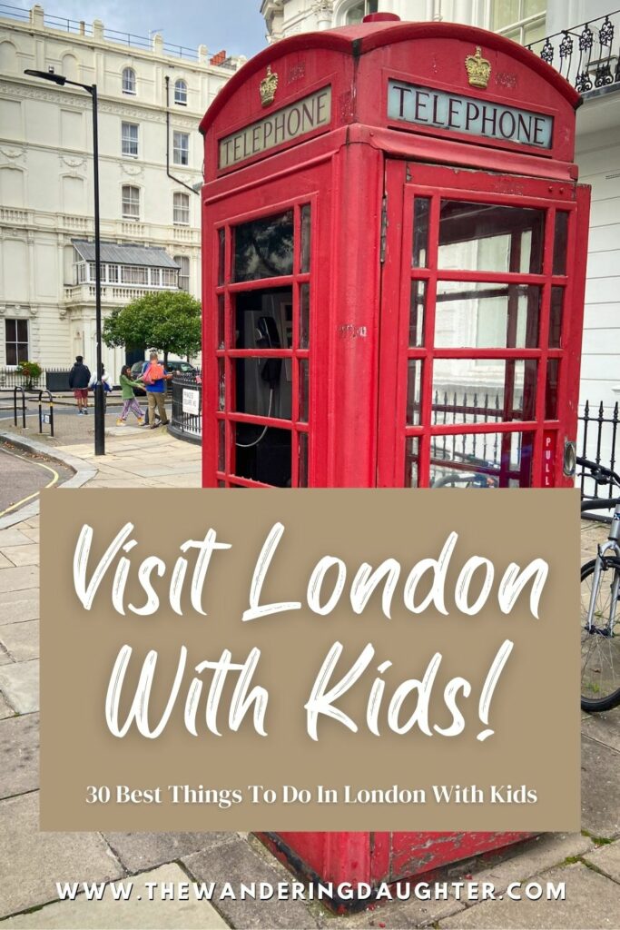 Visit London With Kids! 30 Best Things To Do In London With Kids | The Wandering Daughter | Pinterest image of a red telephone booth on the sidewalk with text overlay.