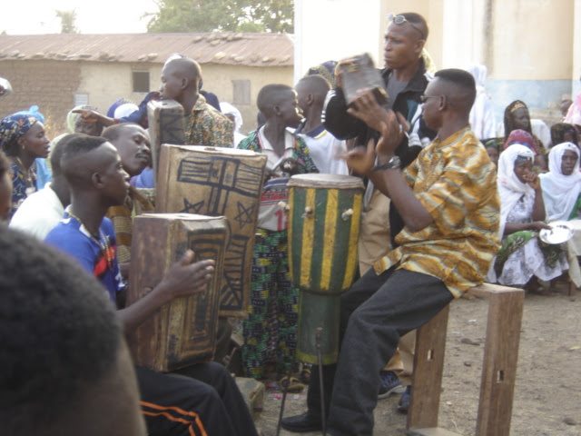 African drummers in Togo playing music to inspire travel