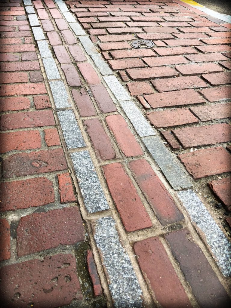 A view of the red brick in Boston while walking the Freedom Trail with kids