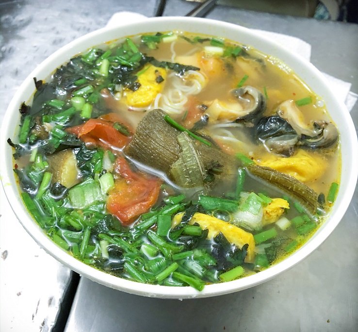 A bowl of snail soup called bun oc, a popular food in Hanoi