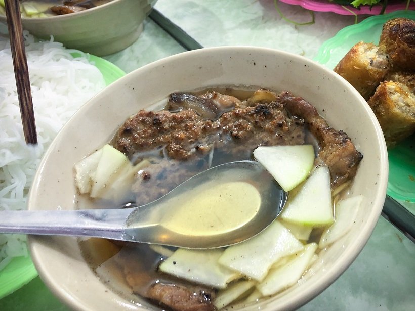 A bowl of bun cha at a restaurant serving food in Hanoi