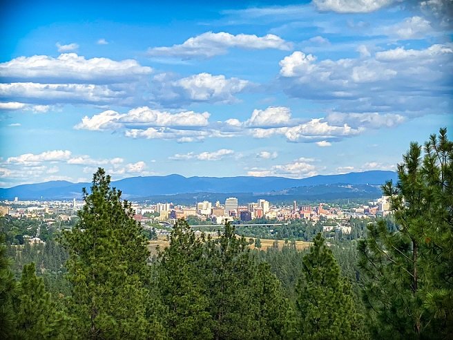 A semi-aerial view of downtown Spokane from Palisades Park while hiking in Spokane