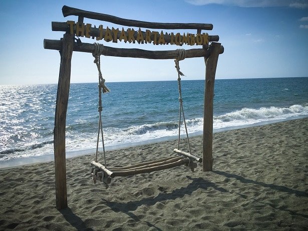 A swing on the beach, one of the things to do in Lombok, Indonesia.