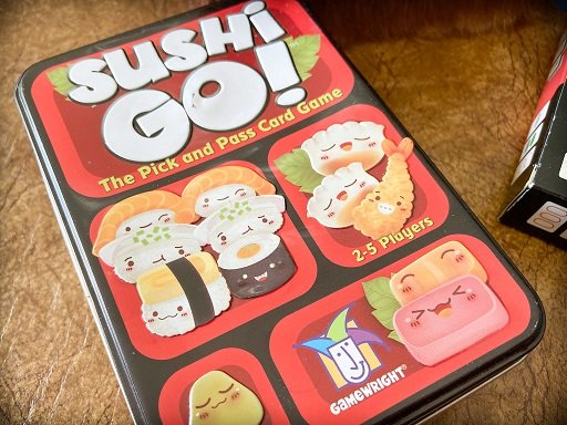 Travel card games for families: Sushi Go!