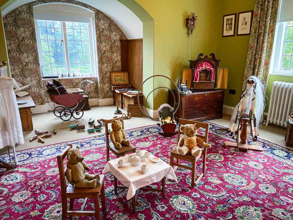 A child's nursery with toys from the early 1900s at Winterbourne House, one of the places to visit in the West Midlands, UK